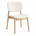 Sedia in tessuto crema con struttura in legno di quercia